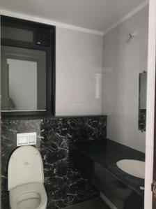 Common Bathroom Image of 1700 Sq.ft 3 BHK Apartment / Flat for sale in Lodha Palava Trinity A To C, Palava Phase 2 Thane for Rs. 14200000