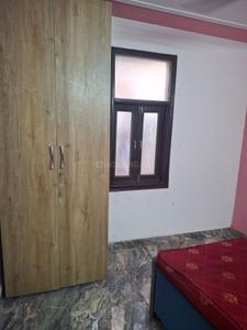 Bedroom Image of 720 Sq.ft 2 BHK Builder Floor for rent in Rajpur Khurd Extension New Delhi for Rs. 25000