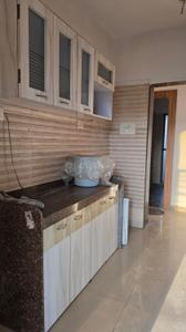 Kitchen Image of 1050 Sq.ft 2 BHK Apartment / Flat for sale in Tharwani Rosabella, Kharghar Navi Mumbai for Rs. 12000000