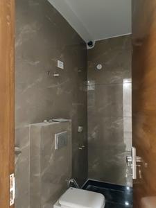 Common Bathroom Image of 900 Sq.ft 3 BHK Builder Floor for rent in Aman Floors, Sector 24 Rohini New Delhi for Rs. 24000