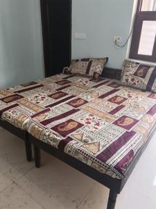 Bedroom Image of Ginni Co Living PG in Sector 33, Gurgaon