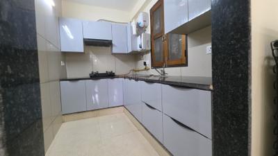 Kitchen Image of 800 Sq.ft 2 BHK Apartment / Flat for rent in Rajpur New Delhi for Rs. 32000