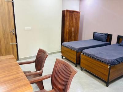 Bedroom Image of Sharma ji Pg in Sector 20, Noida
