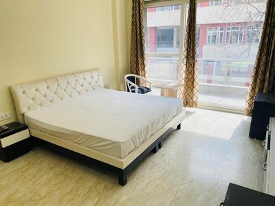 Bedroom Image of URBANROOMZ COLIVING PG GOLF COURSE ROAD in Sector 53, Gurgaon