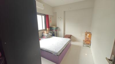 Bedroom Image of 1215 Sq.ft 2 BHK Apartment / Flat for sale in Shivam Pearl 79, Shilaj Ahmedabad for Rs. 6500000