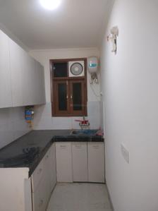 Kitchen Image of 500 Sq.ft 1 BHK Apartment / Flat for rent in Rajpur Khurd Extension New Delhi for Rs. 14000