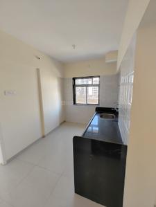 Kitchen Image of 1030 Sq.ft 2 BHK Apartment / Flat for rent in Olive Phase III Pranjee Garden City, Badlapur East Badlapur for Rs. 14000