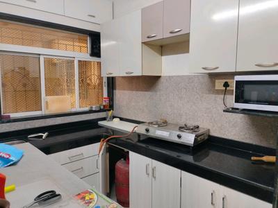 Kitchen Image of 1150 Sq.ft 2.5 BHK Apartment / Flat for sale in V R Keshav Kunj 2, Sanpada Navi Mumbai for Rs. 26000000