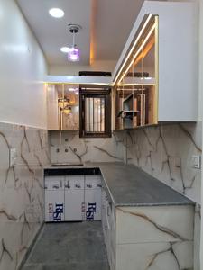 Kitchen Image of 600 Sq.ft 2 BHK Builder Floor for sale in Hastsal New Delhi for Rs. 2790000
