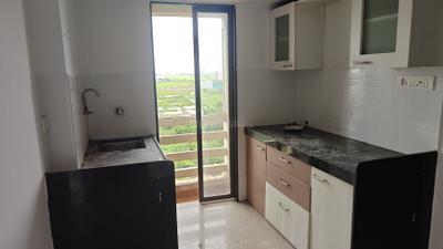 Kitchen Image of 660 Sq.ft 1 BHK Apartment / Flat for sale in Ekta Parksville, Virar West Virar for Rs. 2950000