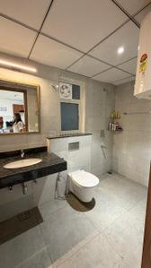 Bathroom Image of 710 Sq.ft 1 BHK Apartment / Flat for rent in Godrej Golf Link, Jaypee Greens Greater Noida for Rs. 30000