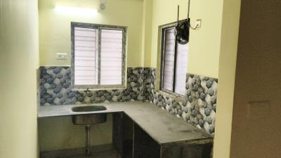 Kitchen Image of 610 Sq.ft 2 BHK Apartment / Flat for sale in Dharitri New Royal Enclave, New Town Kolkata for Rs. 3100000