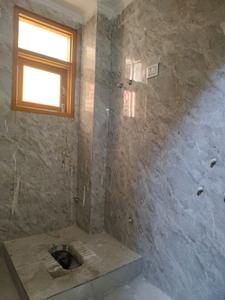 Common Bathroom One Image of 680 Sq.ft 2 BHK Apartment / Flat for sale in Khanpur New Delhi for Rs. 3800000