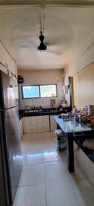 Kitchen Image of 750 Sq.ft 2 BHK Apartment / Flat for sale in  Sarita Nagari CHS, Dattawadi Pune for Rs. 9500000