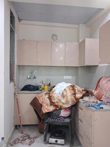 Kitchen Image of 980 Sq.ft 2 BHK Apartment / Flat for sale in GCM Gomati Apartment, Sector 49 Noida for Rs. 4000000