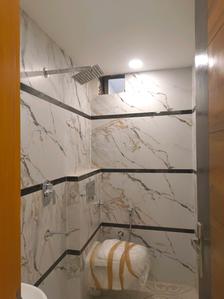 Common Bathroom Image of 600 Sq.ft 2 BHK Builder Floor for sale in Mahavir Enclave New Delhi for Rs. 5500000