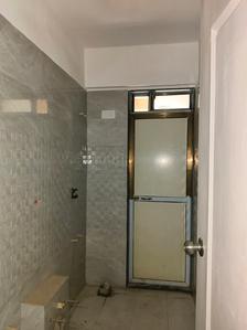 Common Bathroom Image of 740 Sq.ft 2 BHK Apartment / Flat for sale in Cosmos Meluha, Khidkali Thane for Rs. 6800000