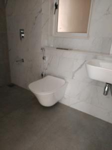 Common Bathroom Image of 1127 Sq.ft 2 BHK Apartment / Flat for sale in Lodha Bella Vita, Mohammed Wadi Pune for Rs. 9800000