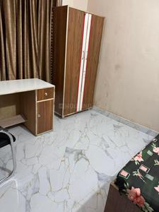 Bedroom Image of DocDen PG for Girls Fully Furnished in Pratap Vihar, Ghaziabad