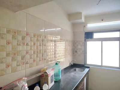 Kitchen Image of 900 Sq.ft 2 BHK Apartment / Flat for rent in Puraniks Rumah Bali, Kasarvadavali Thane for Rs. 20000