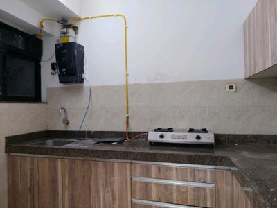 Kitchen Image of 649 Sq.ft 2 BHK Apartment / Flat for sale in Sunteck City Avenue 2, Goregaon West Mumbai for Rs. 18500000