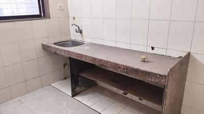 Kitchen Image of 890 Sq.ft 2 BHK Apartment / Flat for sale in Shiv Simiran Apartment, Kopar Khairane Navi Mumbai for Rs. 15200000