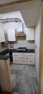 Kitchen Image of 1019 Sq.ft 2 BHK Independent House for rent in  Dayanand Colony RWA, Lajpat Nagar New Delhi for Rs. 40300
