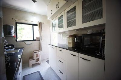 Kitchen Image of 828 Sq.ft 2 BHK Apartment / Flat for sale in Gurukul Ahmedabad for Rs. 6000000