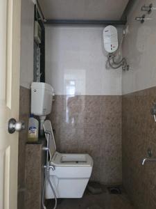 Common Bathroom Image of 600 Sq.ft 1 BHK Apartment / Flat for sale in Nalasopara West Nala Sopara for Rs. 3000000