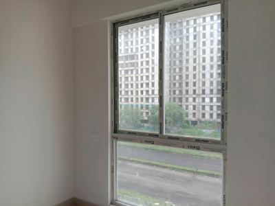 Bedroom Image of 920 Sq.ft 3 BHK Apartment / Flat for sale in Shapoorji Pallonji Shukhobrishti, New Town Kolkata for Rs. 6200000