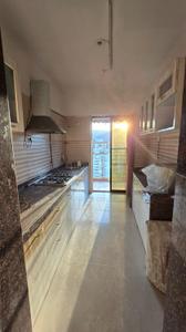 Kitchen Image of 1050 Sq.ft 2 BHK Apartment / Flat for sale in Tharwani Rosabella, Kharghar Navi Mumbai for Rs. 12000000