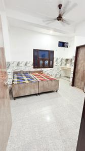 Bedroom Image of sagun home pg  in Sector 44, Noida