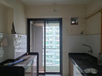 Kitchen Image of 702 Sq.ft 1 BHK Apartment / Flat for sale in Ashapura Galaxy, Ambivli Thane for Rs. 2850005