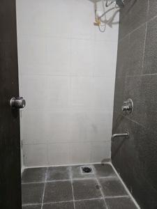 Common Bathroom One Image of 690 Sq.ft 1.5 BHK Apartment / Flat for sale in Majestique Palm Atlantis, Wagholi Pune for Rs. 3851000