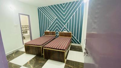 Bedroom Image of raj pg in Sector 22, Noida