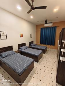Bedroom Image of Ram nam pg in Marine Lines, Mumbai