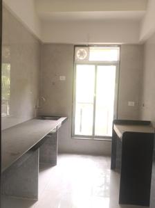 Kitchen Image of 1000 Sq.ft 3 BHK Apartment / Flat for sale in Neelam CHS, Kandivali West Mumbai for Rs. 23500000