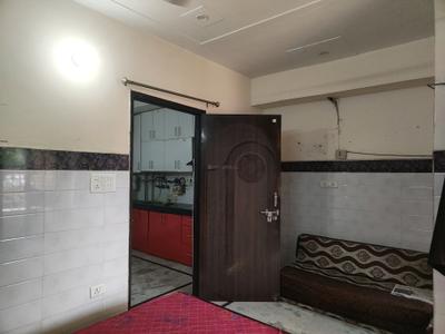 Bedroom Image of 650 Sq.ft 1 BHK Builder Floor for rent in Dwarka Mor New Delhi for Rs. 13500