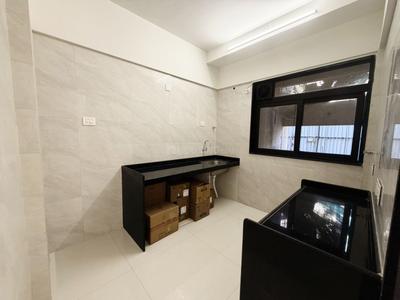 Kitchen Image of 823 Sq.ft 2 BHK Apartment / Flat for sale in Om Manikanta Chsl, Goregaon West Mumbai for Rs. 20600000
