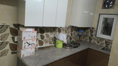 Kitchen Image of 1100 Sq.ft 2 BHK Apartment / Flat for rent in Radhika Apartment, Sector 14 Dwarka New Delhi for Rs. 30000
