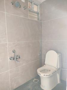 Common Bathroom Image of 909 Sq.ft 2 BHK Apartment / Flat for sale in Habulus Hights, Electronic City Bengaluru for Rs. 4635900