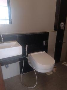 Common Bathroom Image of 600 Sq.ft 1 BHK Apartment / Flat for sale in Rajesh White City, Kandivali East Mumbai for Rs. 13500000