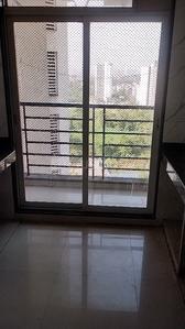 Kitchen Image of 690 Sq.ft 1 BHK Apartment / Flat for sale in Gajra Bhoomi Lawns, Shilgaon Thane for Rs. 3800000
