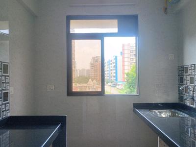 Kitchen Image of 650 Sq.ft 1 BHK Apartment / Flat for sale in Charms Global City, Ambernath East Ambernath for Rs. 3499999