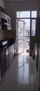 Kitchen Image of 965 Sq.ft 1 RK Apartment / Flat for rent in Prateek Wisteria, Sector 77 Noida for Rs. 14500