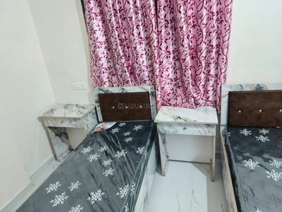 Bedroom Image of SMV Gents &amp; Ladies PG in Kharadi, Pune