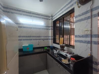 Kitchen Image of 1050 Sq.ft 2 BHK Apartment / Flat for rent in Kopar Khairane Navi Mumbai for Rs. 45000