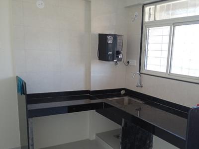 Kitchen Image of 939 Sq.ft 2 BHK Apartment / Flat for rent in Tukai Darshan Pune for Rs. 21000