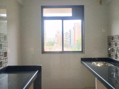 Kitchen Image of 650 Sq.ft 1 BHK Apartment / Flat for sale in Shivam Homes Wing A And B, Badlapur East Badlapur for Rs. 2300000