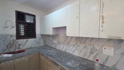 Kitchen Image of 915 Sq.ft 3 BHK Builder Floor for rent in Palam New Delhi for Rs. 25000